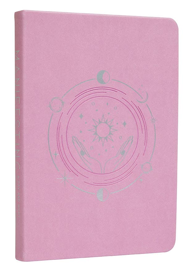 Pink notebook with celestial design on a white background