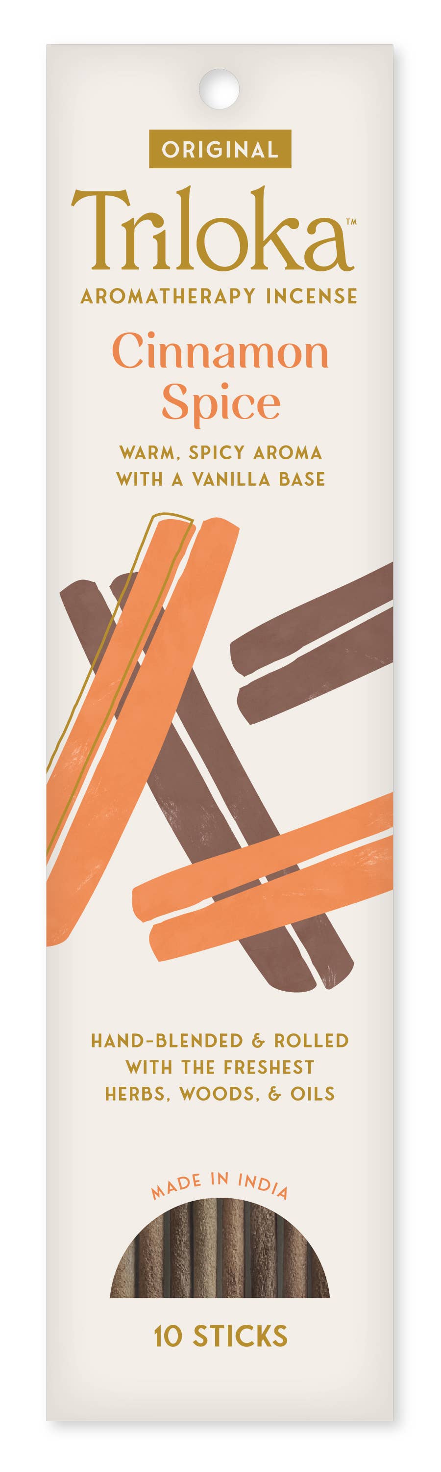 Triloka Cinnamon Spice aromatherapy incense packaging on a white background
