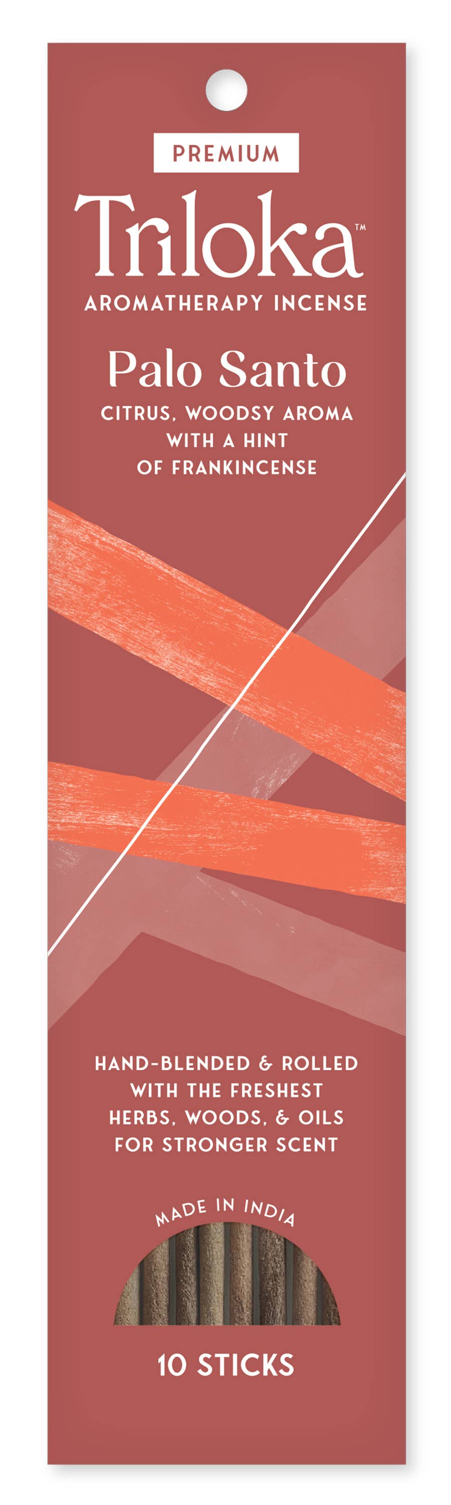 Triloka Palo Santo incense packaging with a red background