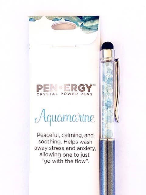 An Aquamarine crystal power pen by Penergy, shown next to its white packaging card with blue-green watercolor accents and product text.